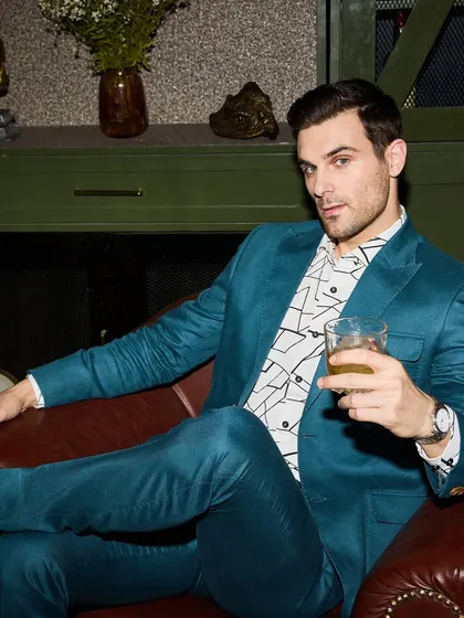 Proving that formal wear can be bold, this teal green linen suit is perfect for destination weddings or stylish daytime events. The vibrant color combined with the lightweight fabric ensures you stay cool and look exceptionally sharp.