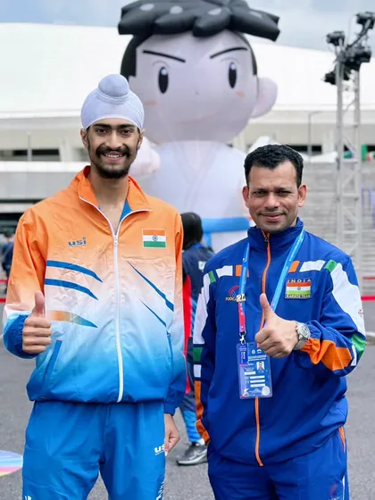 With my coach, Aniket Sir, at the Asian Championship. His mentorship has been a guiding force throughout my journey, from a local kid to an international athlete.