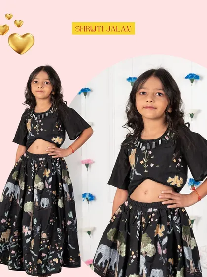 A closer look at the details of my black jungle-print lehenga. The thread work embroidery and mirror work neckline make this a truly special piece.