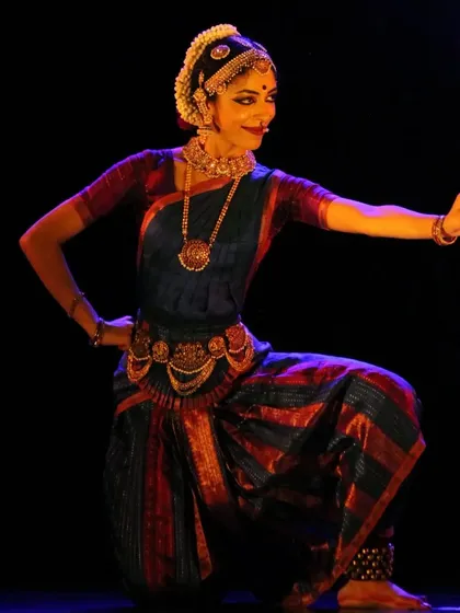 A moment of complete surrender, or 'Shringara Sharanagati', from a recent performance. This pose captures the essence of devotion that I strive to embody in my dance and impart to my students in our Bharatanatyam classes. It represents the core of my artistic expression.