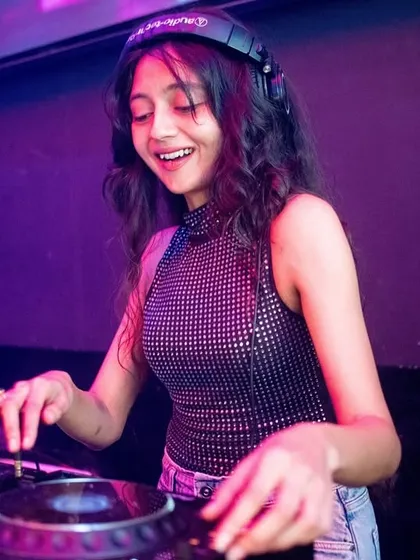 Focused on the mix at Makati. I take pride in my technical skills, ensuring smooth transitions between tracks to keep the dance flow seamless.