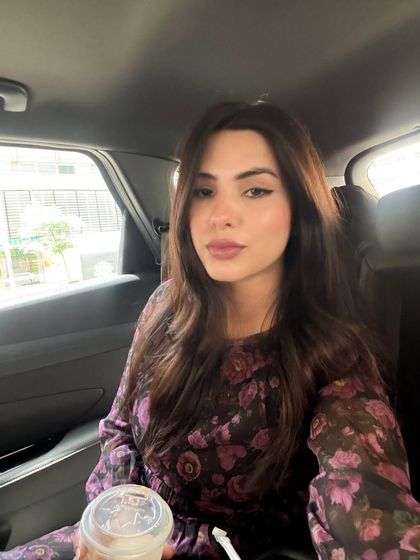 A slightly different angle of the car selfie, providing variety for a brand's content feed while maintaining a consistent look and feel.