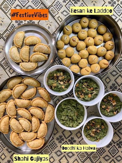 A beautiful festive platter with homemade Besan ke Laddoos, Shahi Gujiyas, and Doodhi ka Halwa. These are the tastes that make celebrations feel like home.