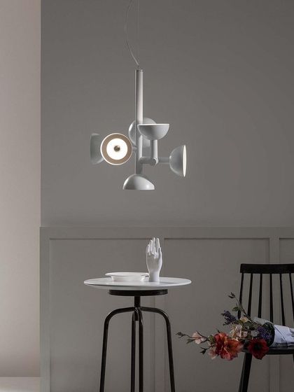 The Sibilla chandelier in a white finish, offering a softer, more subtle take on the design's complex geometric form.