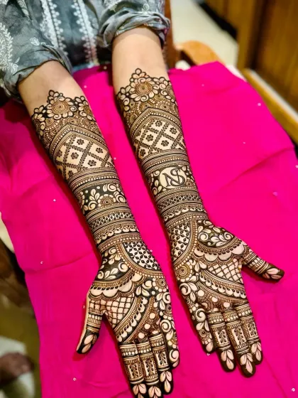 A close-up of the personalized bridal design with initials, showing the clean lines and detailed work.