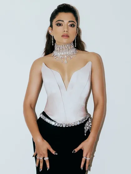 Rashmika Mandanna looking powerful and poised. The custom cat-eye nails I created for her provided a striking contrast to her white corset, highlighting the meticulous attention to detail in her styling.