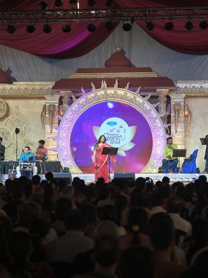 A wide view of the stage at the 62nd Bengaluru Ganesh Utsava. It took a large, dedicated team of artists and researchers to bring this show, "Udho Udho - Our Gods and Us," to life.