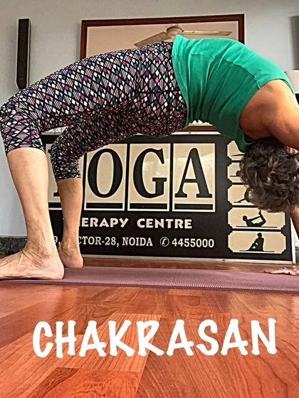 This is a strong Wheel Pose, showing the deep arch in my back. My classes build the foundation needed for such advanced asanas.