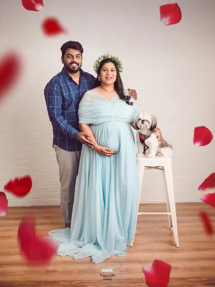 Welcoming a new baby is a family affair, and that includes furry members too. This maternity photo shows how we love to include pets in our sessions to capture the whole family's excitement.
