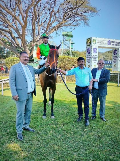 Power of Beauty, with jockey Arvind Kumar.N, after winning the memorial trophy.