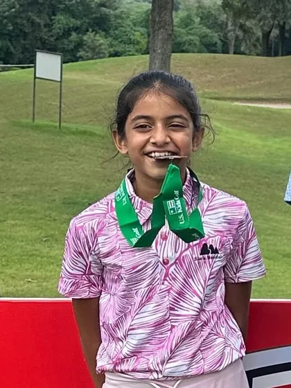 A joyful Suhani Chandra after her podium finish at the US Kids Golf Championship.
