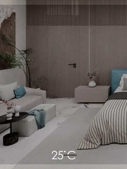 A full view of the serene bedroom, showcasing a calm color scheme of beige, white, and light blue. The design combines a comfortable bed with a small sofa, creating a multi-functional and restful personal space.