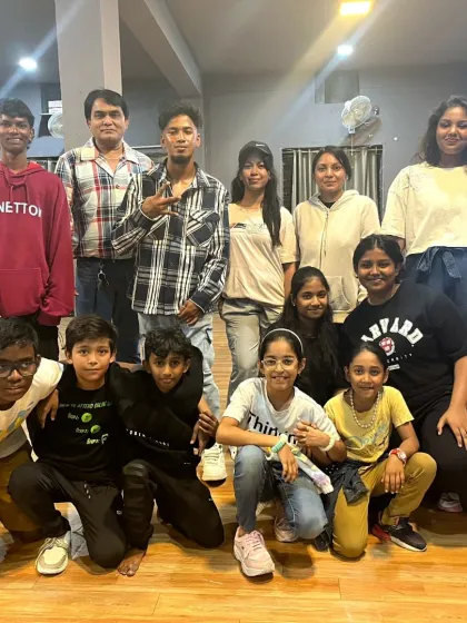 A happy group photo after a successful and mesmerizing dance workshop. You can see the enthusiasm on everyone's faces after a session of learning and having fun together.