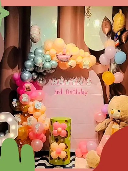 A beary cute teddy bear theme for Aavya's 3rd birthday! The setup features soft colors, a giant teddy bear, and flower-shaped balloon decorations.