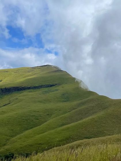 A beautiful shot of the Nethravathi peak with clouds just starting to drift over the top.