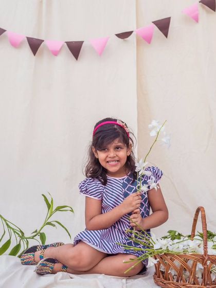 A sweet and simple look with this striped and geometric print dress. The cap sleeves and relaxed fit make it an ideal choice for a warm day.
