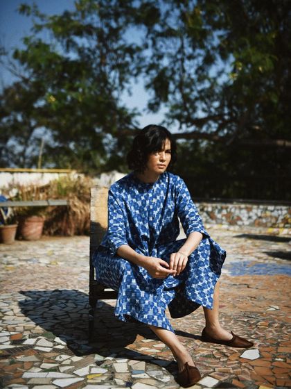 Another portrait from the rooftop series for House of Wandering Silk, this time with a more contemplative and serene mood.