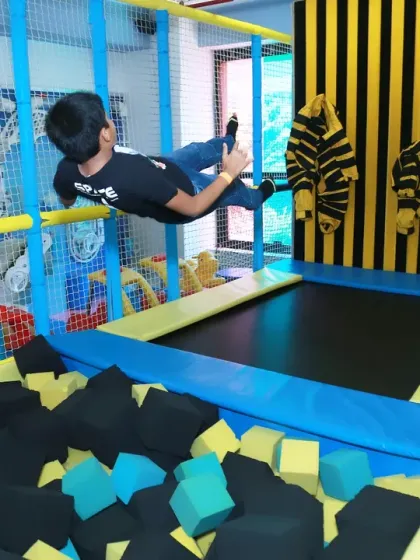 Another fantastic action shot from the trampoline. Capturing kids in motion is a great way to show their energy and adventurous spirit.