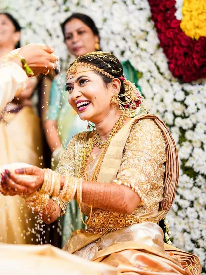 A happy bride makes the most beautiful picture. Rakshita's makeup enhances her features without overpowering her natural beauty.