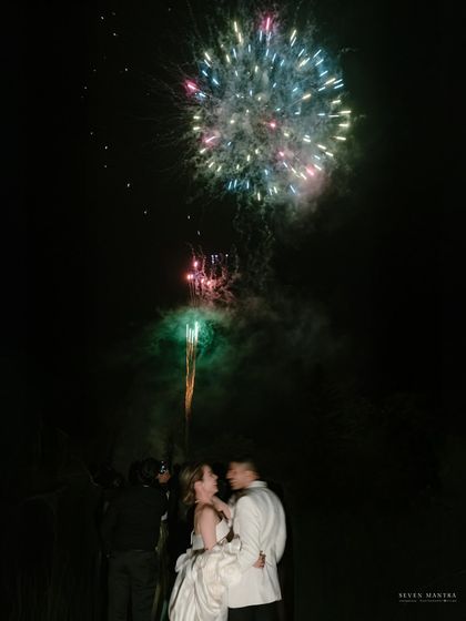 A quiet moment together watching the fireworks. Even amidst the grandest celebrations, I look for the intimate connections.