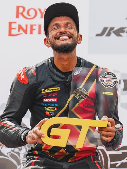 The pure joy of victory. Anish Shetty celebrating his win in the Royal Enfield GT Cup.