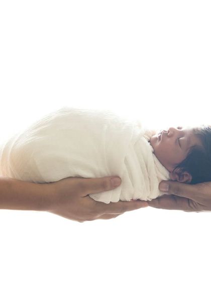 A collection of intimate moments with new parents adoring their newborn baby. I use high-key lighting to create a soft, bright, and emotional feel.