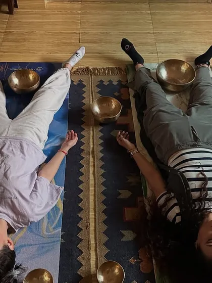 A shared journey of relaxation for two. In this couples session, bowls are placed strategically around both individuals to create a harmonized field of vibration, fostering connection and mutual peace.
