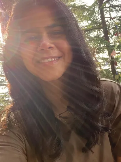 A sun-kissed, happy moment from a trip to Dharamkot. The mountains have a way of bringing out your inner light.