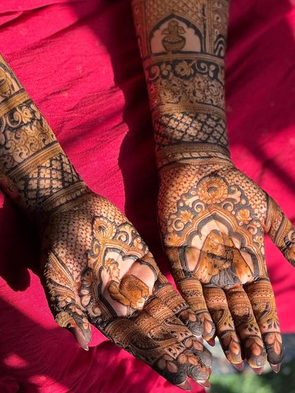 Both hands together, presenting a complete and beautiful story of the couple, ready for their wedding day.