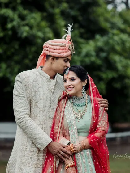 The final result is a happy bride who feels confident and beautiful. This candid moment between the couple showcases how my makeup looks natural and radiant in person, allowing the bride's joy to shine through.