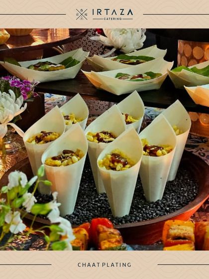 Chaat is all about fresh, vibrant flavors. Here is a selection of chaat served in eco-friendly leaf boats and paper cones for easy handling at a busy event.