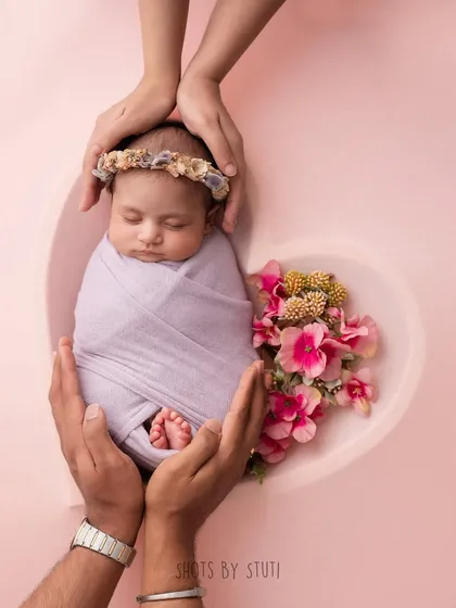 This is where the magic begins. I love creating artistic, beautifully styled portraits that turn a fleeting moment with your newborn into a timeless piece of art. This heart bowl setup is just one of many creative concepts we can explore for your baby's first photoshoot.