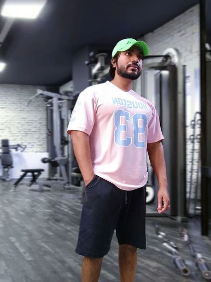 The same pose, but in color. The gym is my second home, a place of energy and hard work.