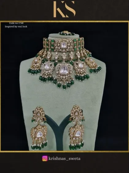 This version of the real-look inspired set features classic emerald green beads, a timeless and elegant choice.