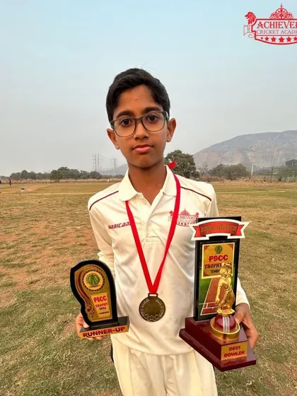 Shaunak Gawade with his 'Best Bowler' and runner-up trophies from the Future Star tournament.