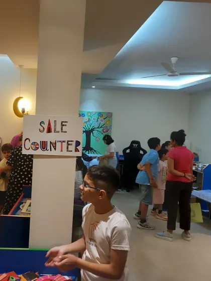 The sale counter at our exhibition was a popular spot! It's always a thrill for students to see their work being appreciated and purchased by art lovers.
