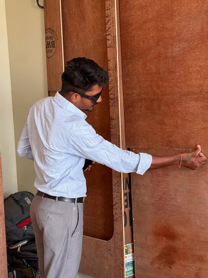 Giving a thumbs-up for the quality of the material and workmanship on-site.