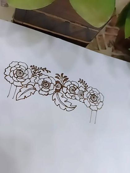 The floral garland element that is used to decorate the swing in the baby shower design.