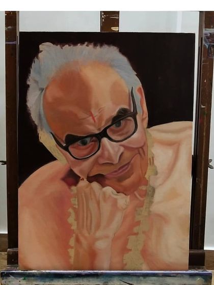 Adding the garland ('haar') to the portrait. This element adds a traditional and personal touch to the commissioned piece.