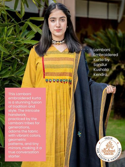 A stunning fusion of tradition and style. This Lambani embroidered kurta features intricate handwork, geometric patterns, and tiny mirrors.