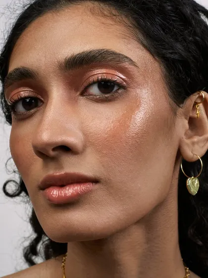 This is an example of my organic approach to beauty photography. The focus is on real, polished skin, highlighted with a soft, dewy glow. I believe in minimal retouching to preserve the authenticity and raw beauty of the subject, creating a portrait that feels both intimate and aspirational.