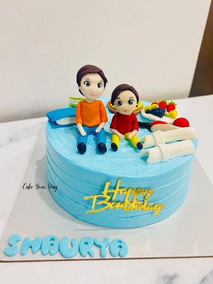 Two best buds chilling on a cake. I created these custom fondant figures to celebrate a 9th birthday with a personal touch.