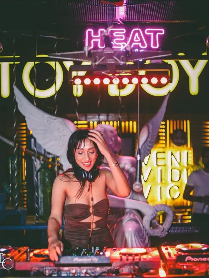 A glimpse into a stylish night at Toy Boy. Even in more intimate and chic settings, I bring a powerful vibe that keeps the energy high and the dance floor moving.