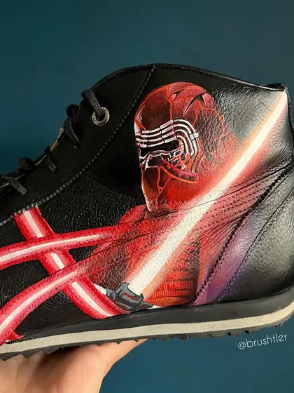 The other shoe features Kylo Ren, with his distinctive lightsaber, creating a full dark side story on this pair of custom sneakers.