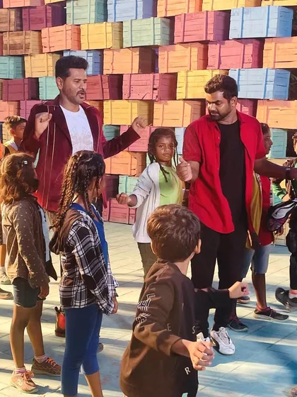 A moment I'll always cherish, working as an assistant choreographer under my idol, Prabhudeva master. Here, we are on the set for the song 'Pocatto', teaching the dance steps to a group of talented kids.