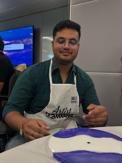 Another happy member of the NetApp team with his completed resin clock. Our goal is to make art enjoyable and rewarding for everyone.