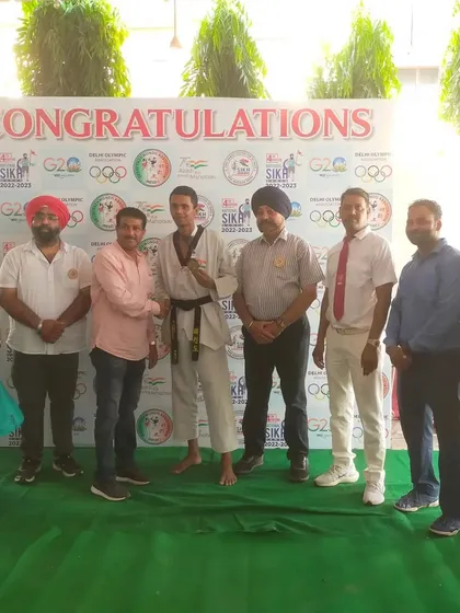 A proud moment with one of our black belt champions at the National Sikh Games.