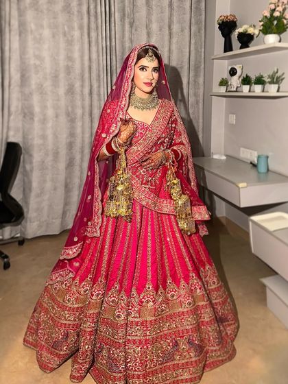 A full-length view of this ethereal bride in her stunning pink lehenga. My goal is to create a look that is not just beautiful up close but also breathtaking from afar.