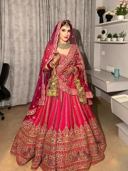 A full-length view of this ethereal bride in her stunning pink lehenga. My goal is to create a look that is not just beautiful up close but also breathtaking from afar.