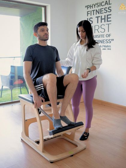 Guiding a client through an exercise on the Wunda Chair. My goal is to empower you with the knowledge of how to move your body correctly and safely.
